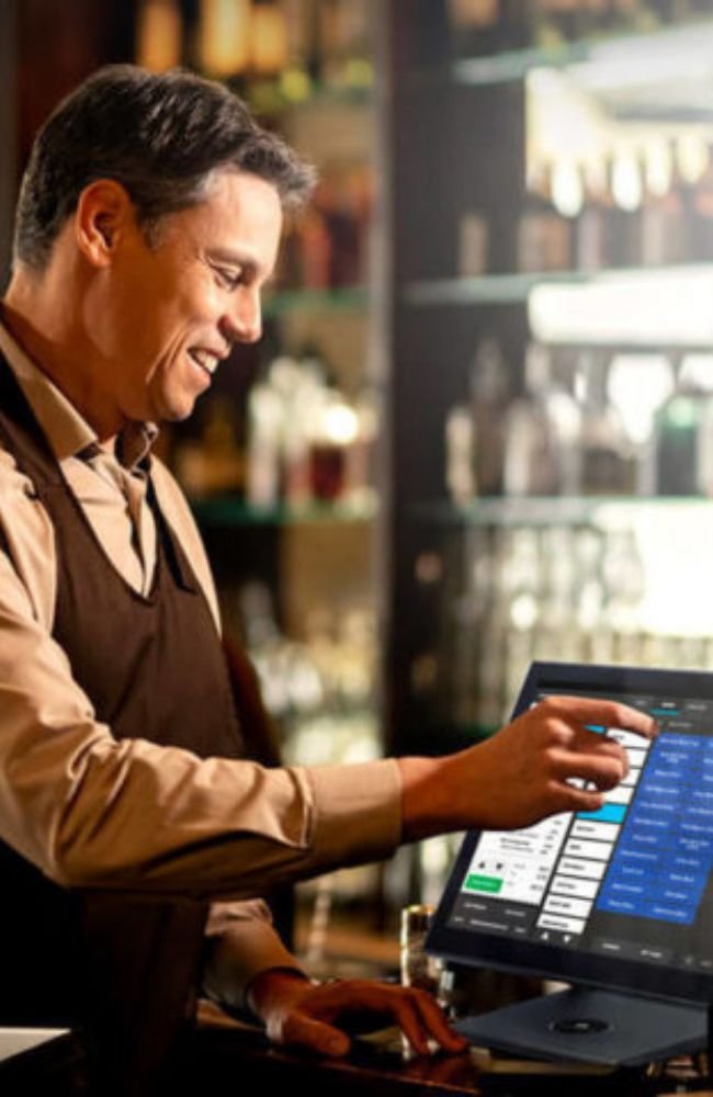 What-is-a-POS-system_server-entering-an-order-into-the-POS-system-e1609863122751