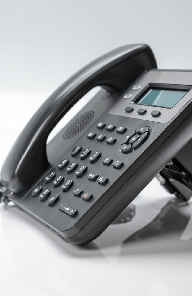 black-telephone-set-with-display-buttons-modern-phone-ip-telephony-scaled
